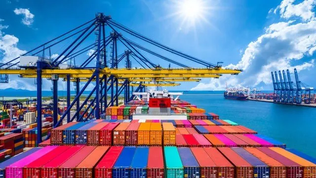 A loaded container vessel under way on open sea